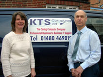 Christine and Ken Seymour, owners of KTS Computers, by their company van
